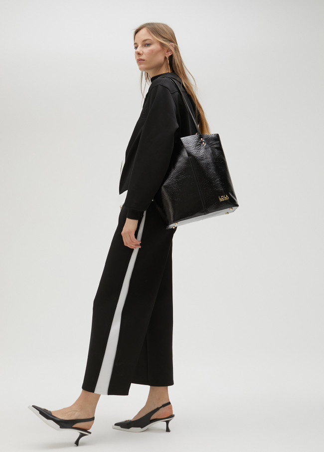 lola casademunt Pantalón negro y blanco en lateral Precio de fábrica