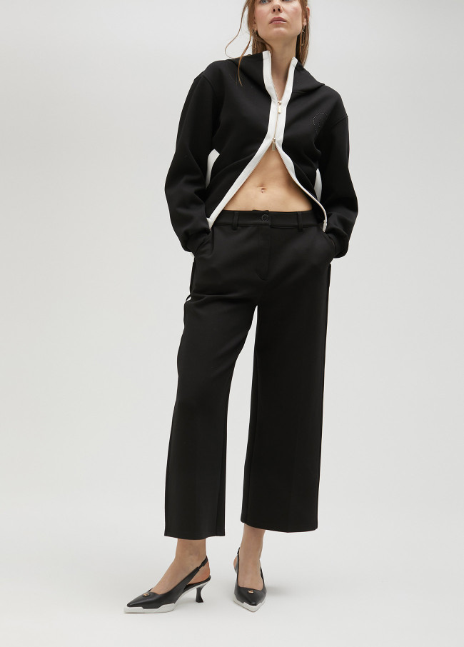 lola casademunt Pantalón negro y blanco en lateral Precio de fábrica