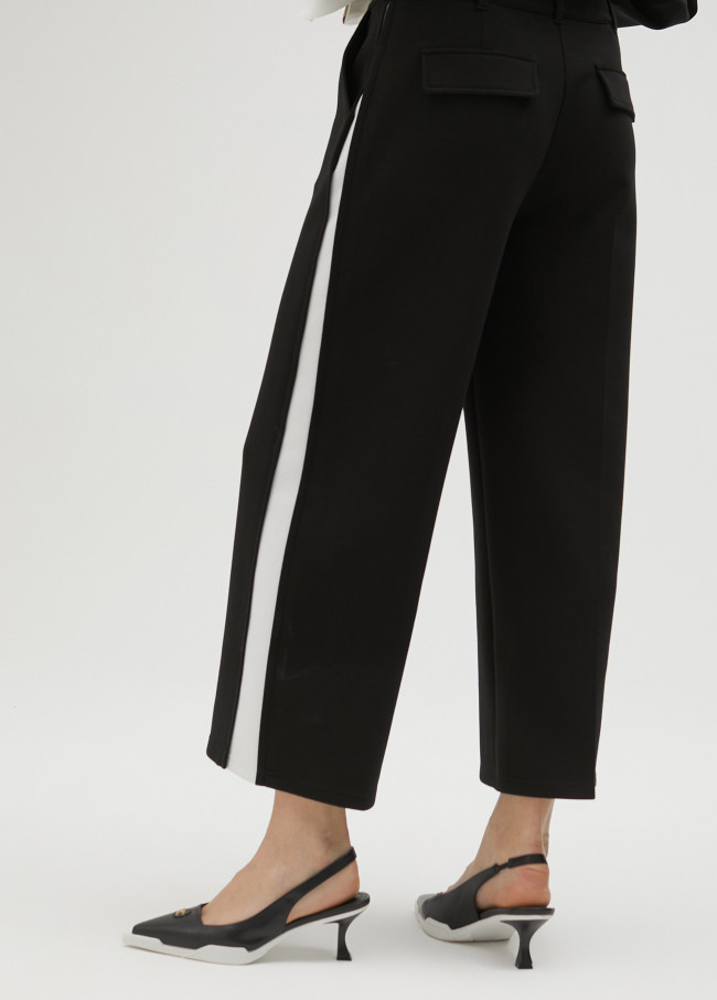 lola casademunt Pantalón negro y blanco en lateral Precio de fábrica