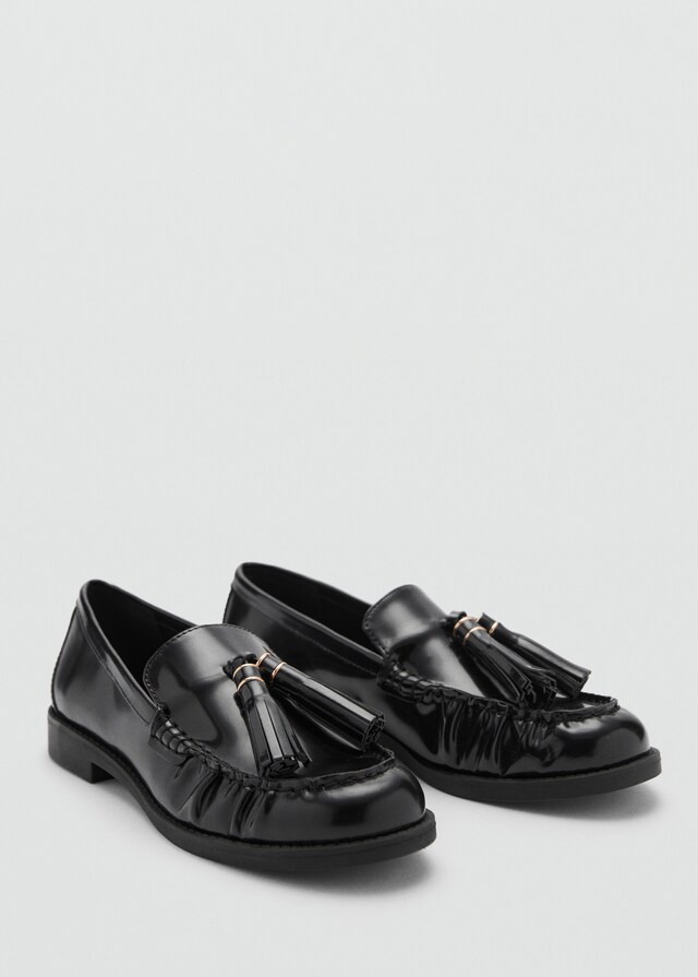 Mango Mocasín piel borlas En oferta